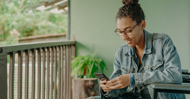 girl scrolling on phone