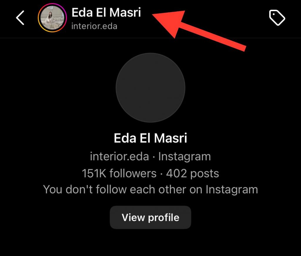 Tap on the Name on DM