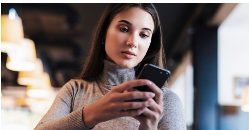 girl checking her phone
