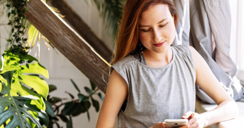 girl checking her phone