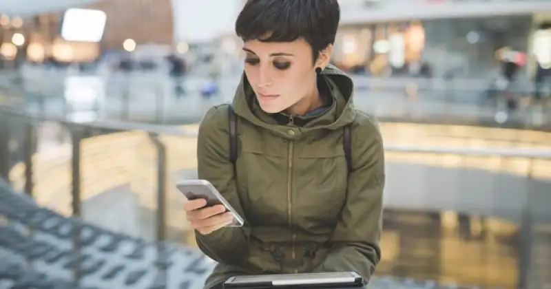 girl checking her phone