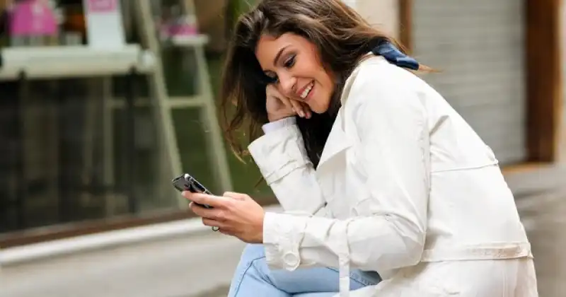 Girl is looking at her phone