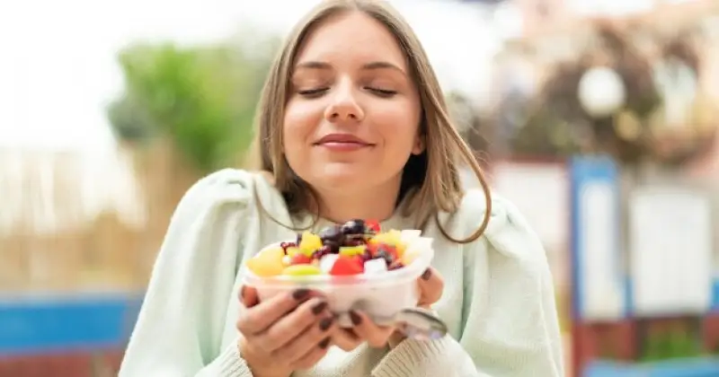 a girl enjoying a desert