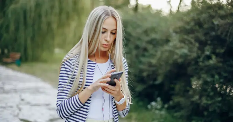 a girl checking her phone