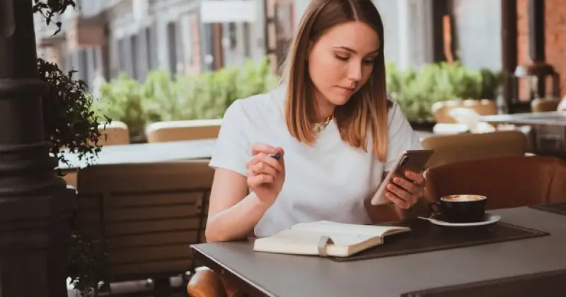 a girl scrolling on her phone