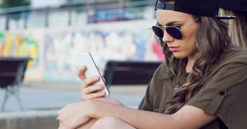 a girl using her phone