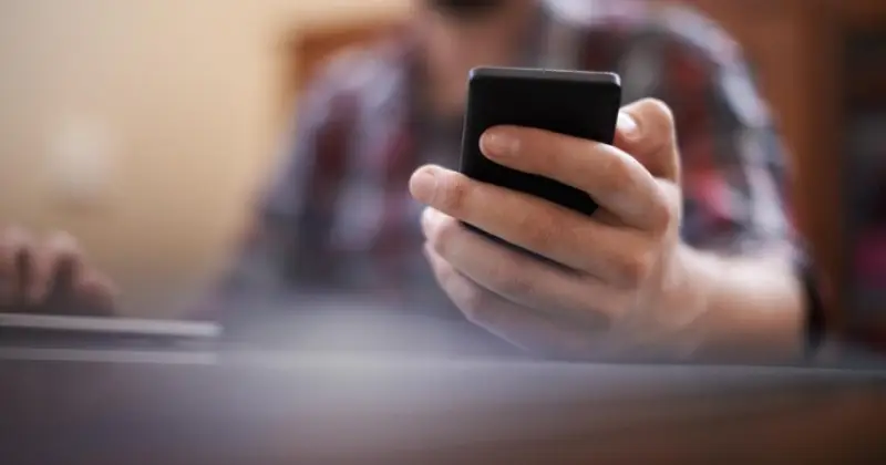 a person checking phone