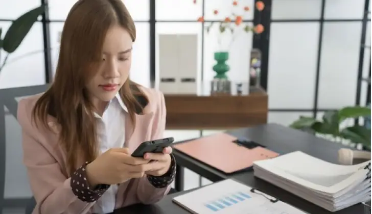 a business girl using her phone