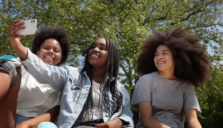 some Gen Z kids taking a selfie