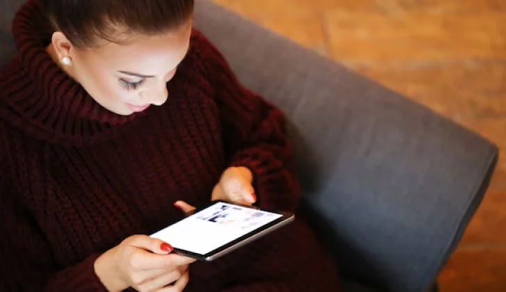 a girl scrolling on her phone