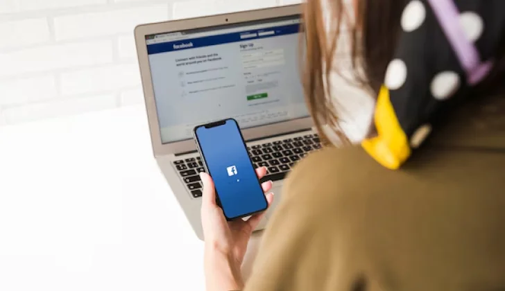 a girl checking her Facebook account