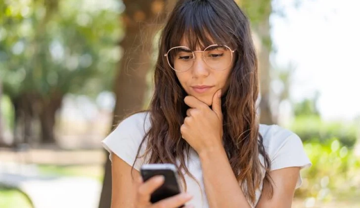 a girl using her phone