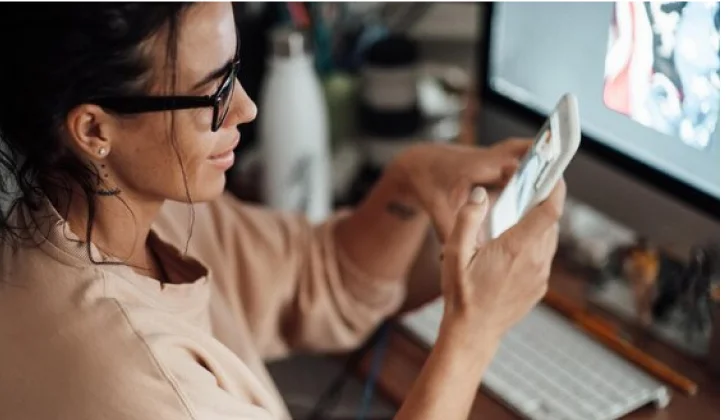 a girl working with her phone