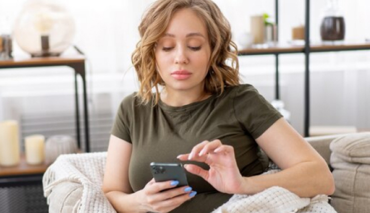 a girl checking her phone