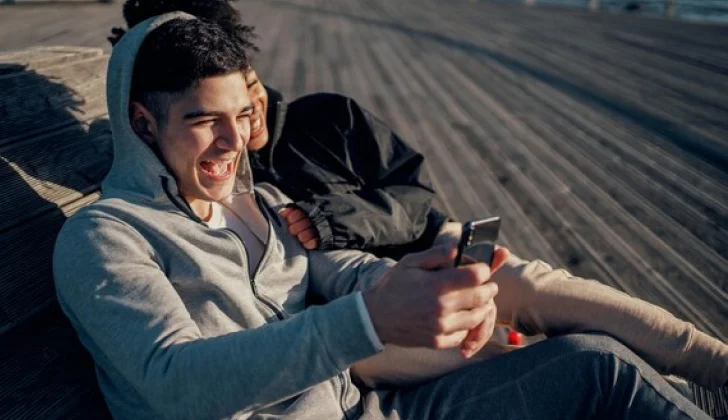 two friends laughing together