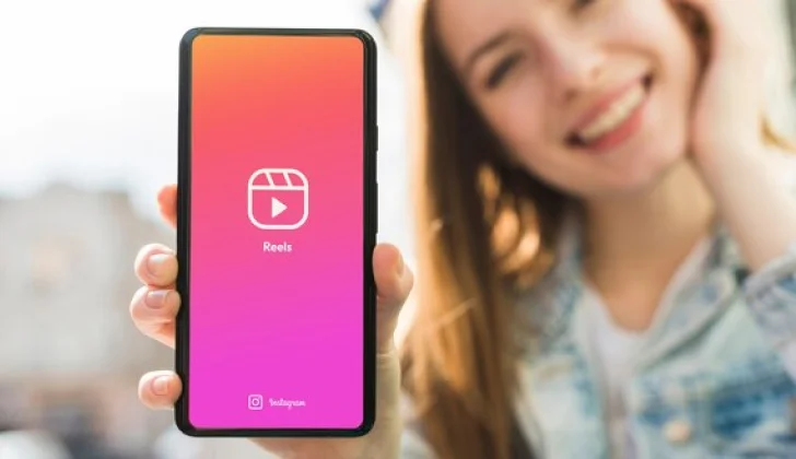 a girl showing an Instagram Reel