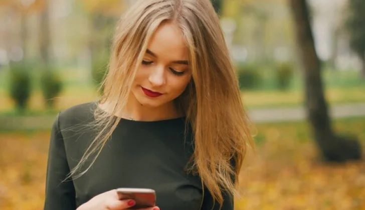 a girl checking her phone