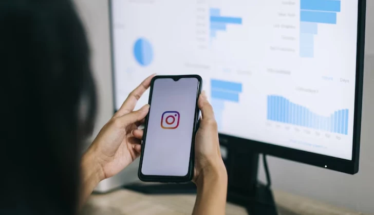 a person checking her Instagram metrics