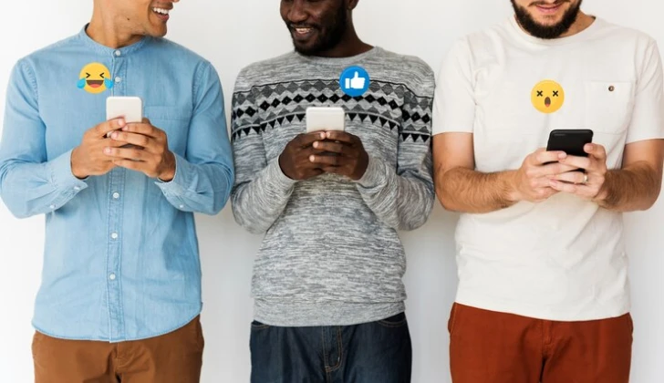 people from different cultures checking phones