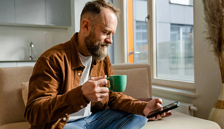a man checking his phone