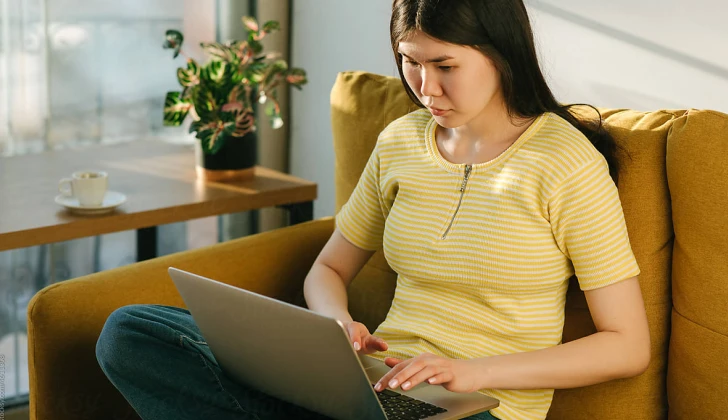 a girl using her laptop