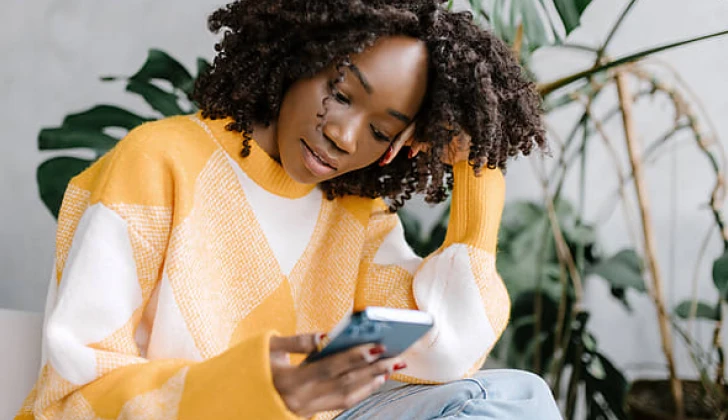 a woman checking her phone