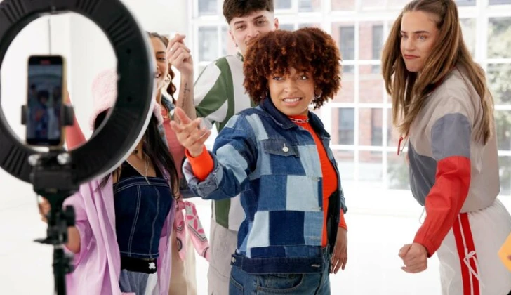 some influencers recording a video