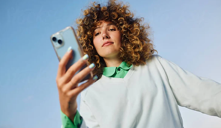 a girl checking her phone