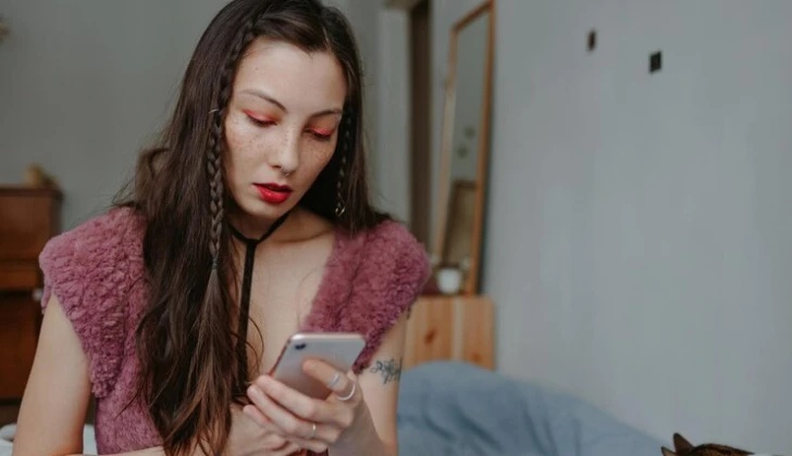 a girl checking her phone