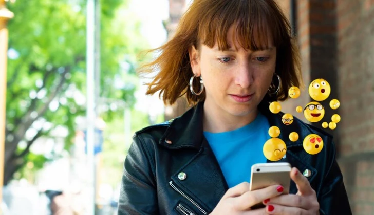 a woman chatting with emojis