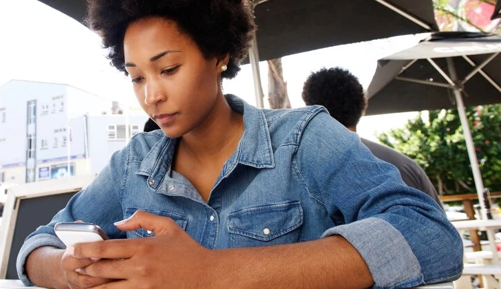 a girl checking her phone