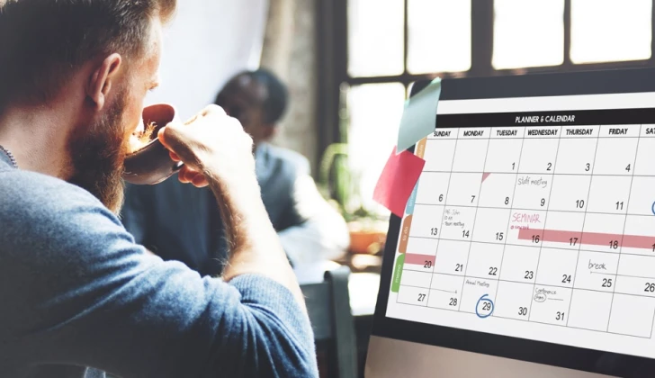 a person setting up a calendar