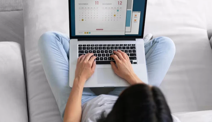 a woman setting up a calendar