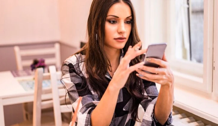 a girl checking social media