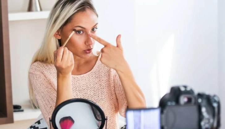 an influencer doing makeup tutorials