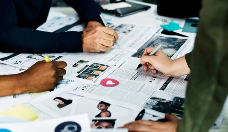 people working on creating content