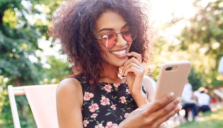 a girl checking her phone