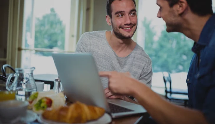 two guys talking about a task