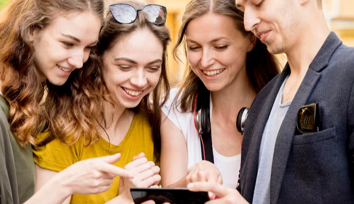 group of friends checking their phone