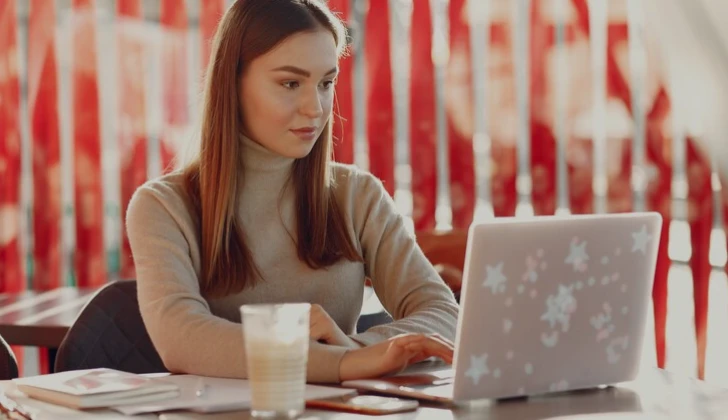 a girl working with laptop