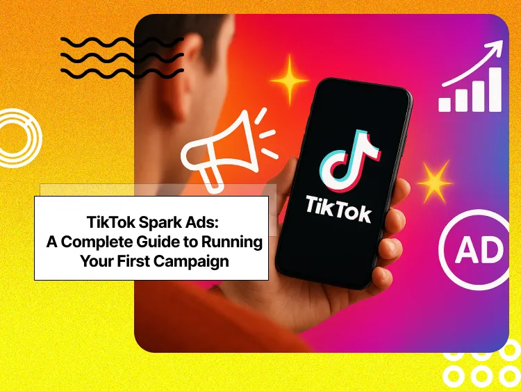 A person holding a phone with TikTok logo on it