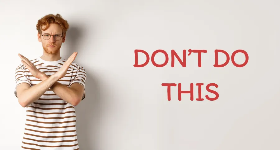 A man crossing his arms in a X manner